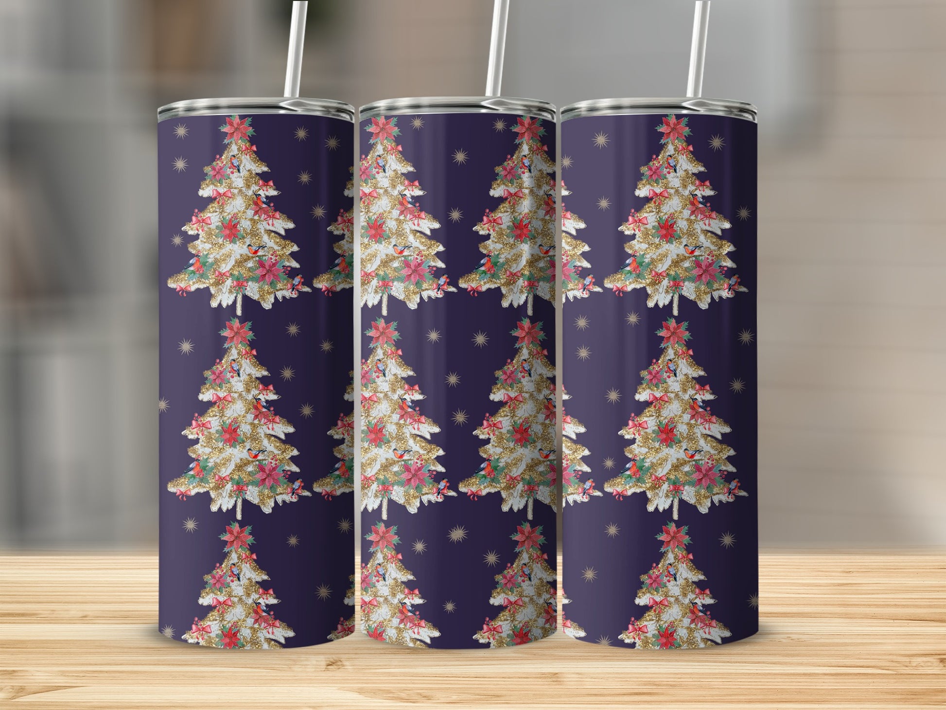 Three tumblers with a repeating pattern of Christmas trees and stars.