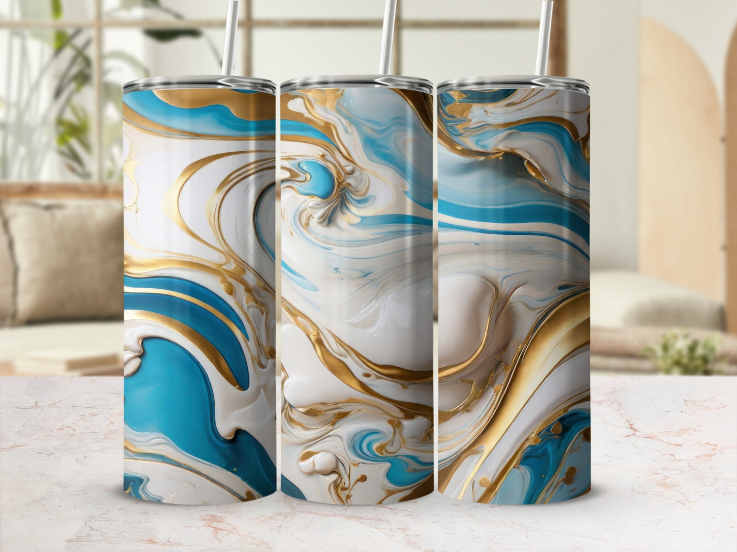 Three tumblers with a blue, white, and gold abstract marbled design.