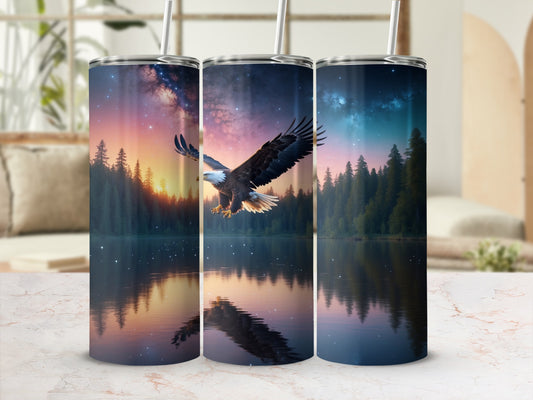Tumbler with eagle flying over calm water at sunset.