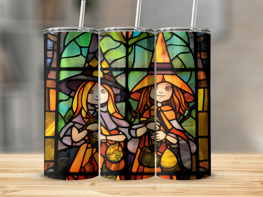 Three tumblers featuring stained glass witches holding lanterns.