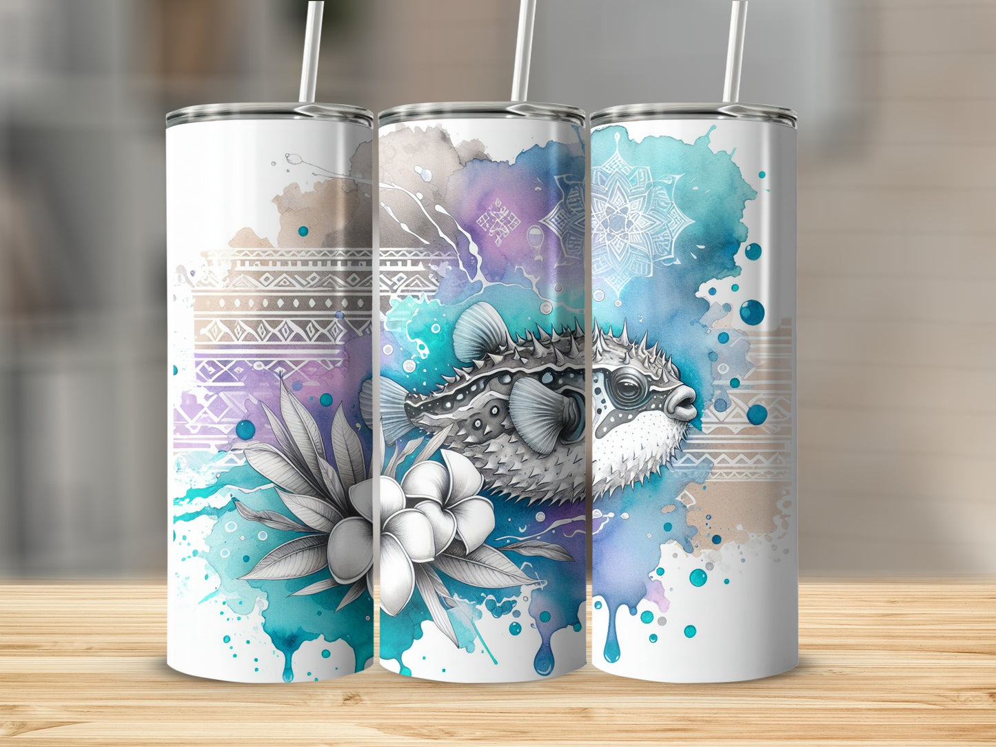Three tumblers with pufferfish and floral watercolor designs.