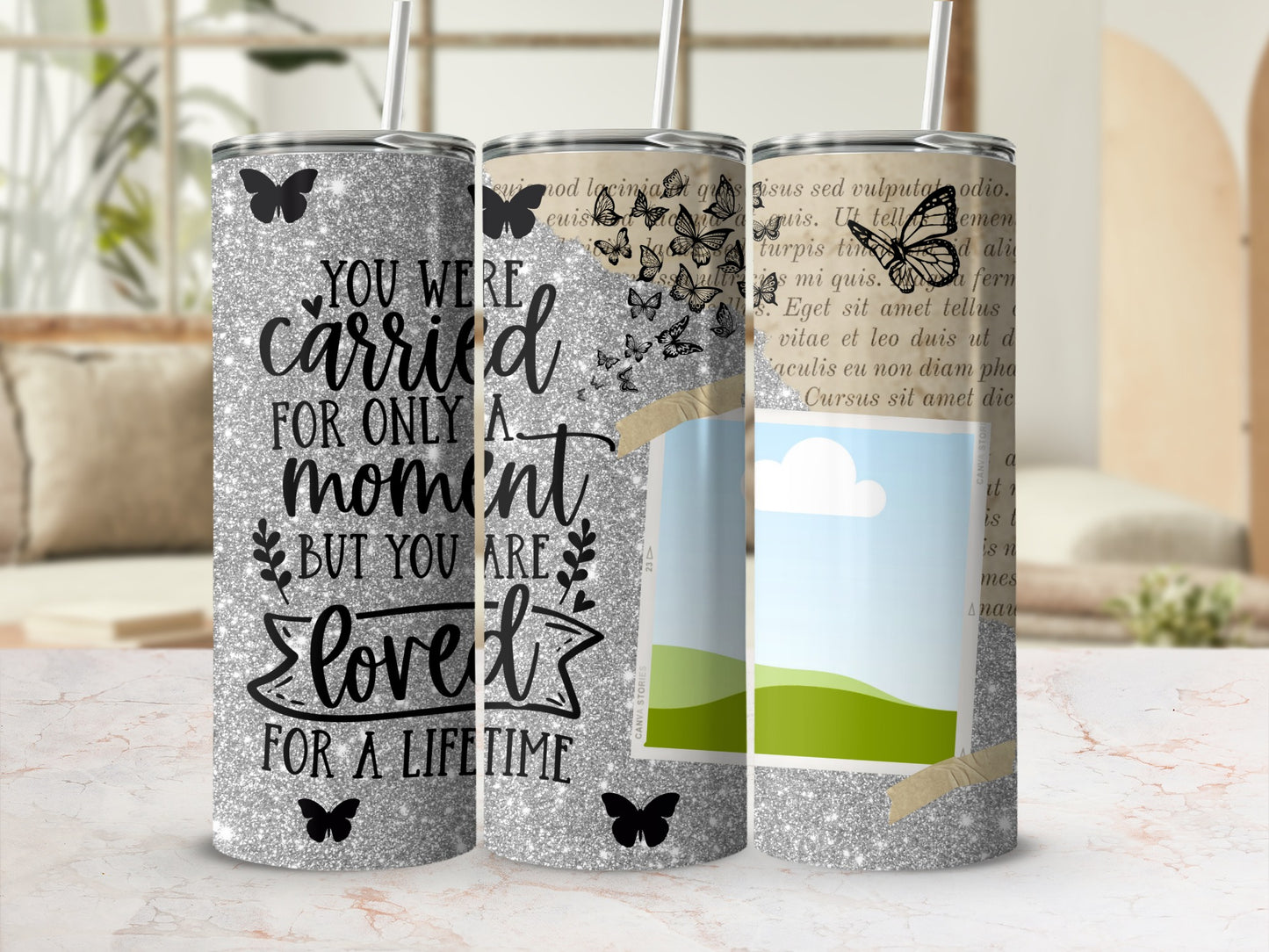 Tumblers with "You were carried for only a moment but you are loved for a lifetime" text.