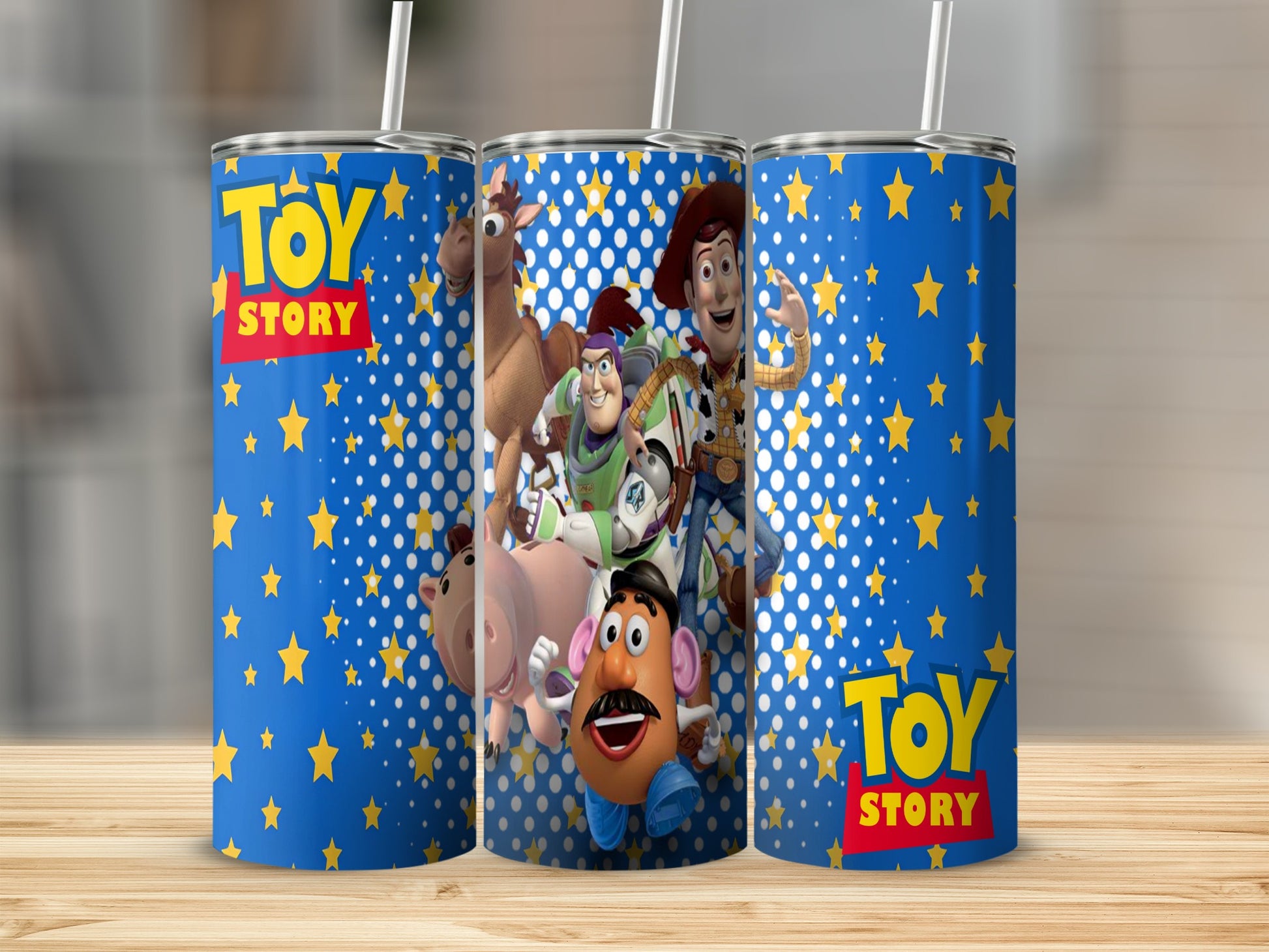 Toy Story characters on a blue tumbler with yellow stars and polka dots.