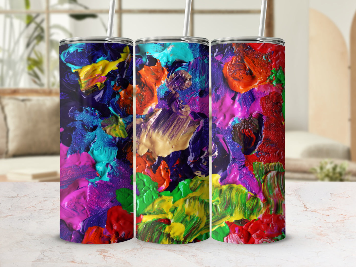 Three tumblers with a vibrant, textured abstract paint design.
