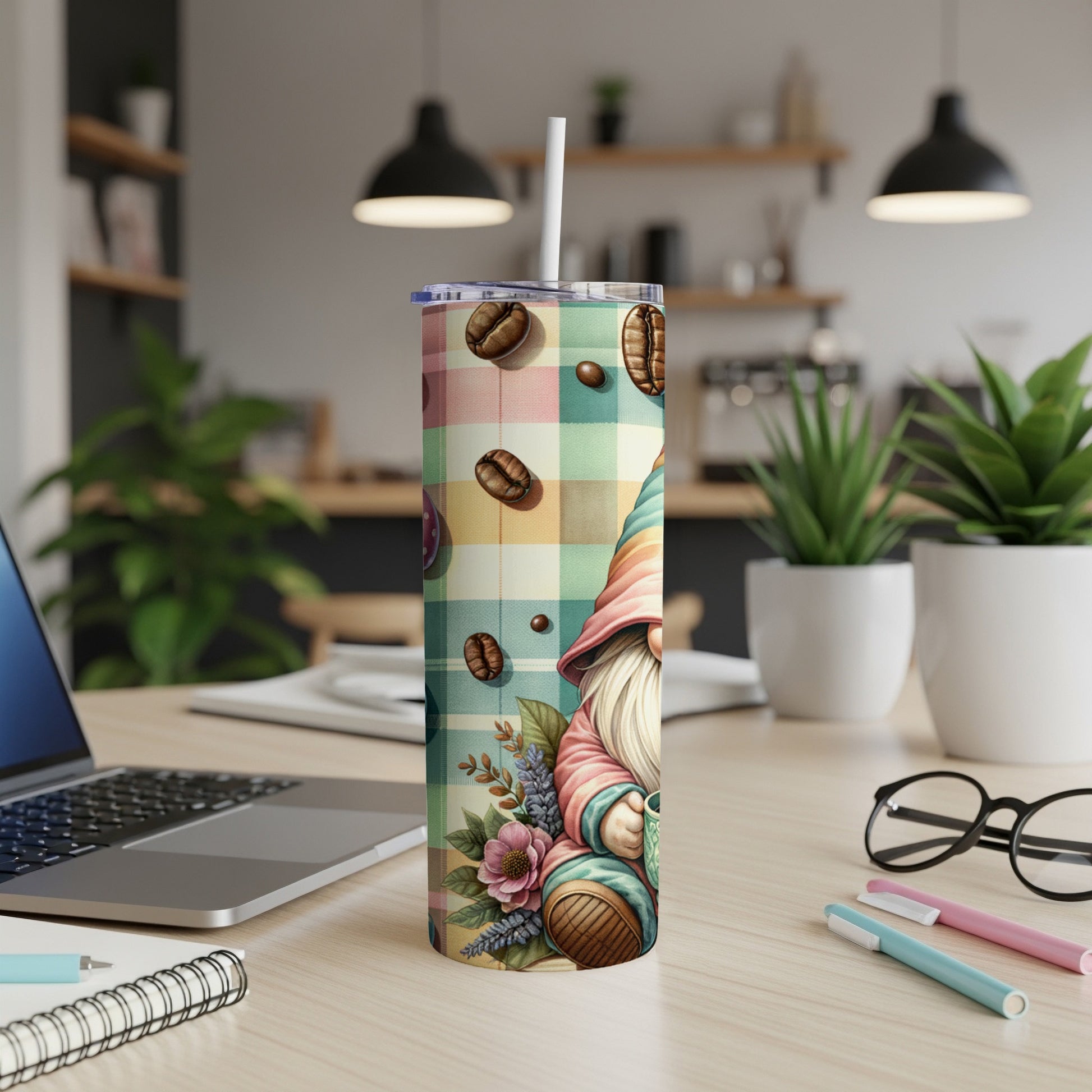 Gnome with coffee beans and flowers on a plaid tumbler.