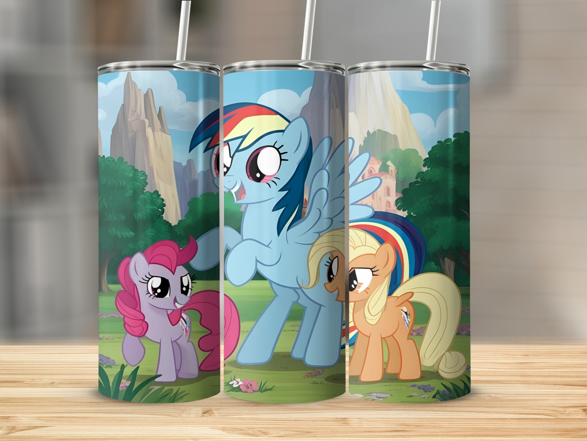 Three My Little Pony characters on a cartoon landscape background.