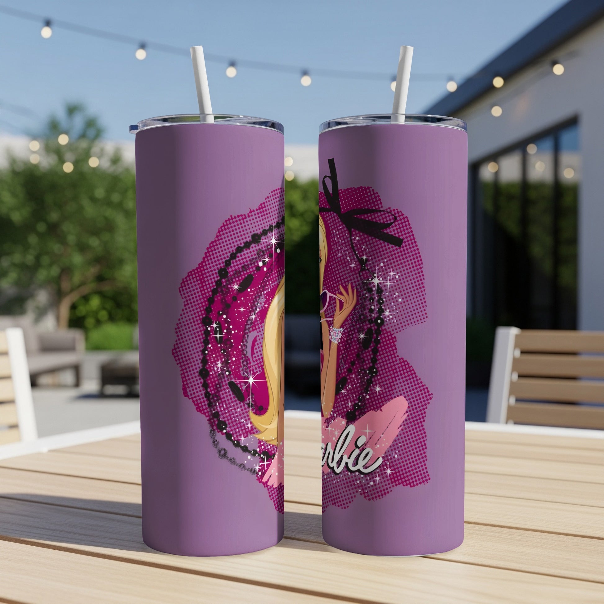 Barbie tumbler with pink and purple graphic design and straw.