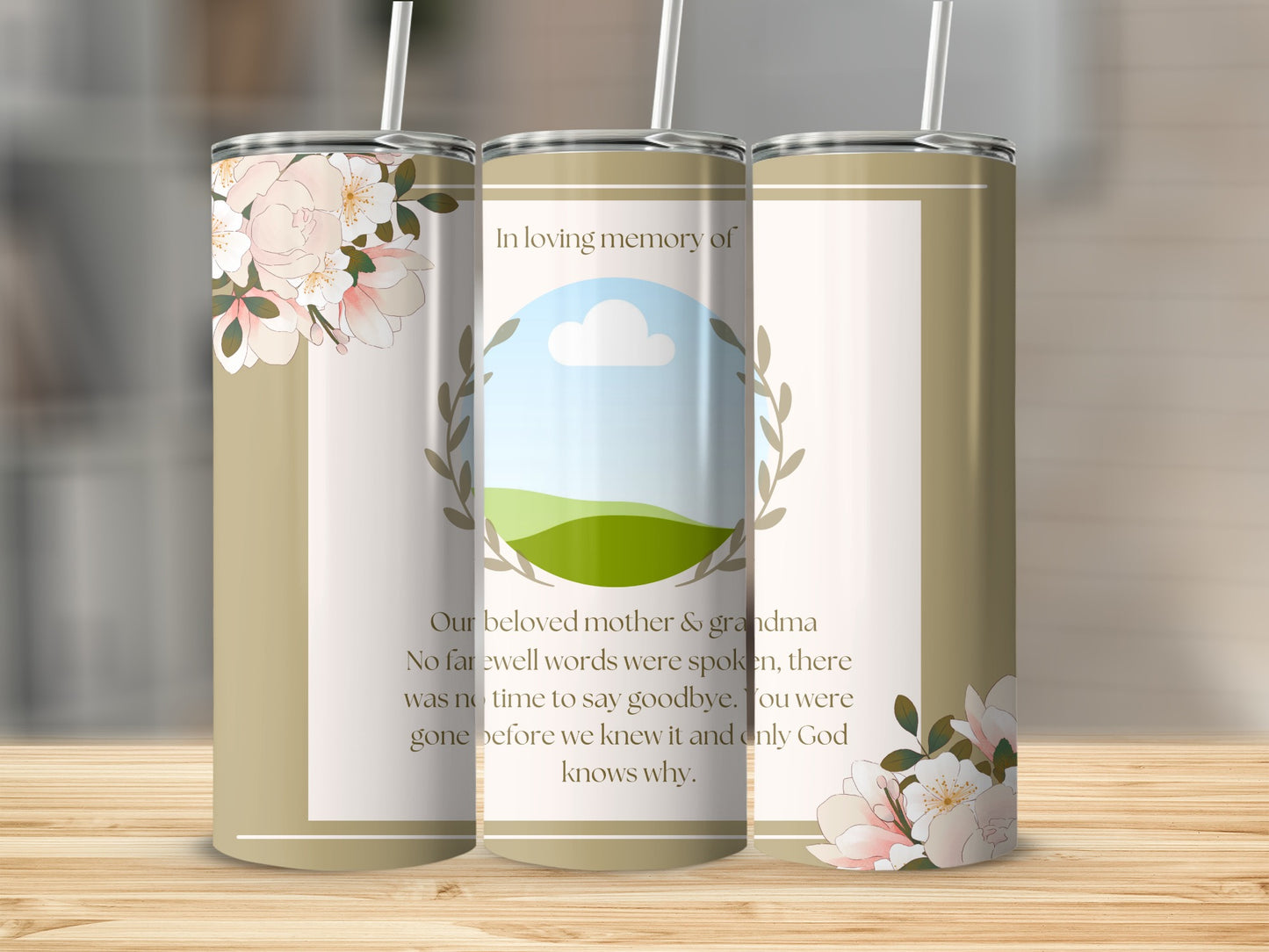 Tumbler with floral design and memorial text.