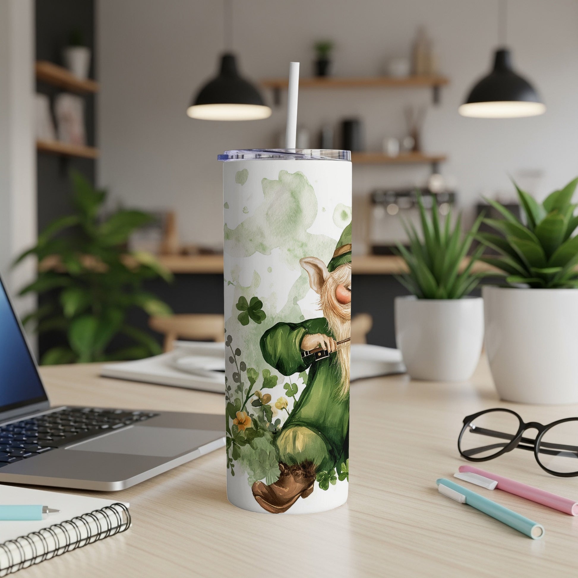 Leprechaun on a St. Patrick's Day tumbler with shamrocks and a straw.
