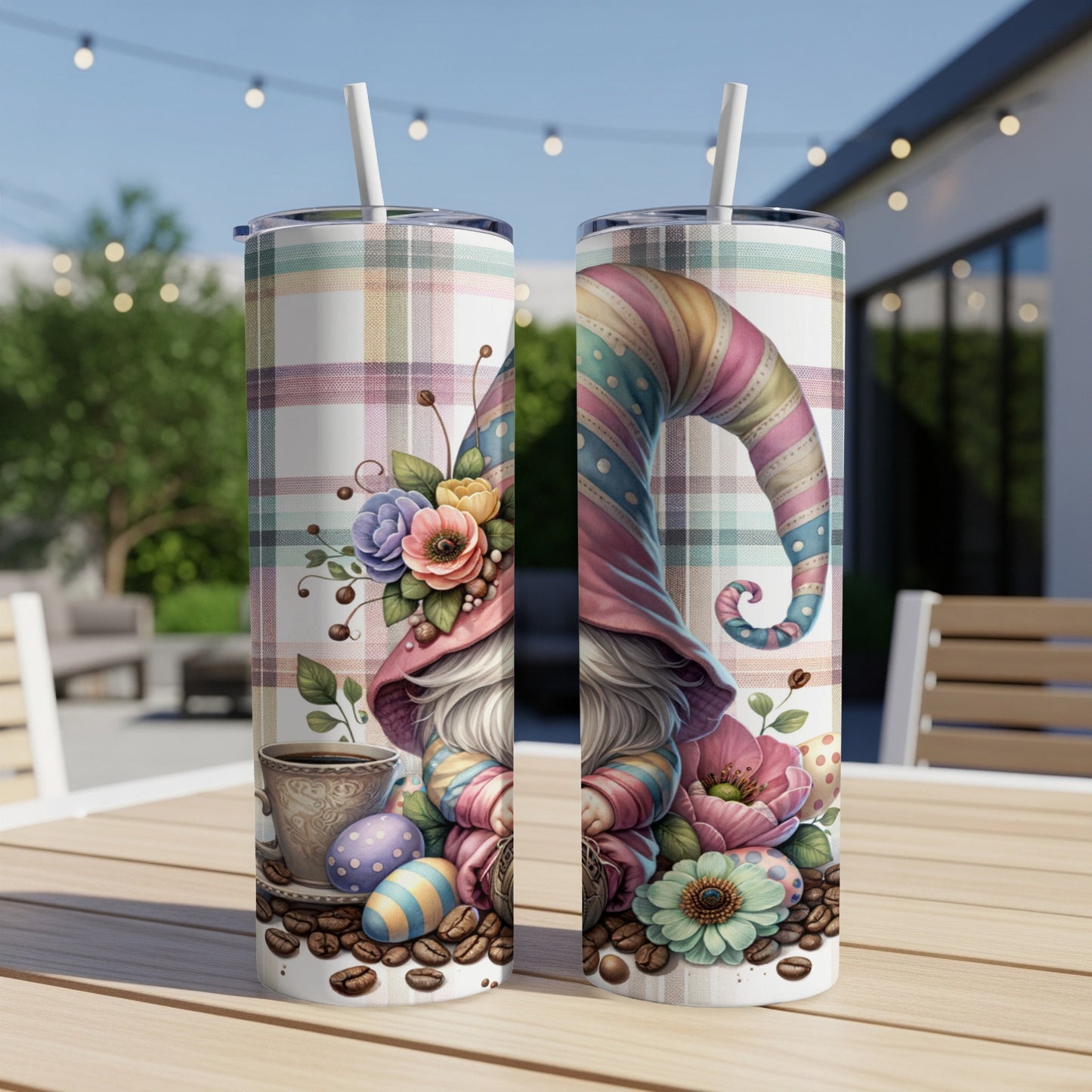 Two tumblers with a gnome, Easter eggs, and coffee, on a table.