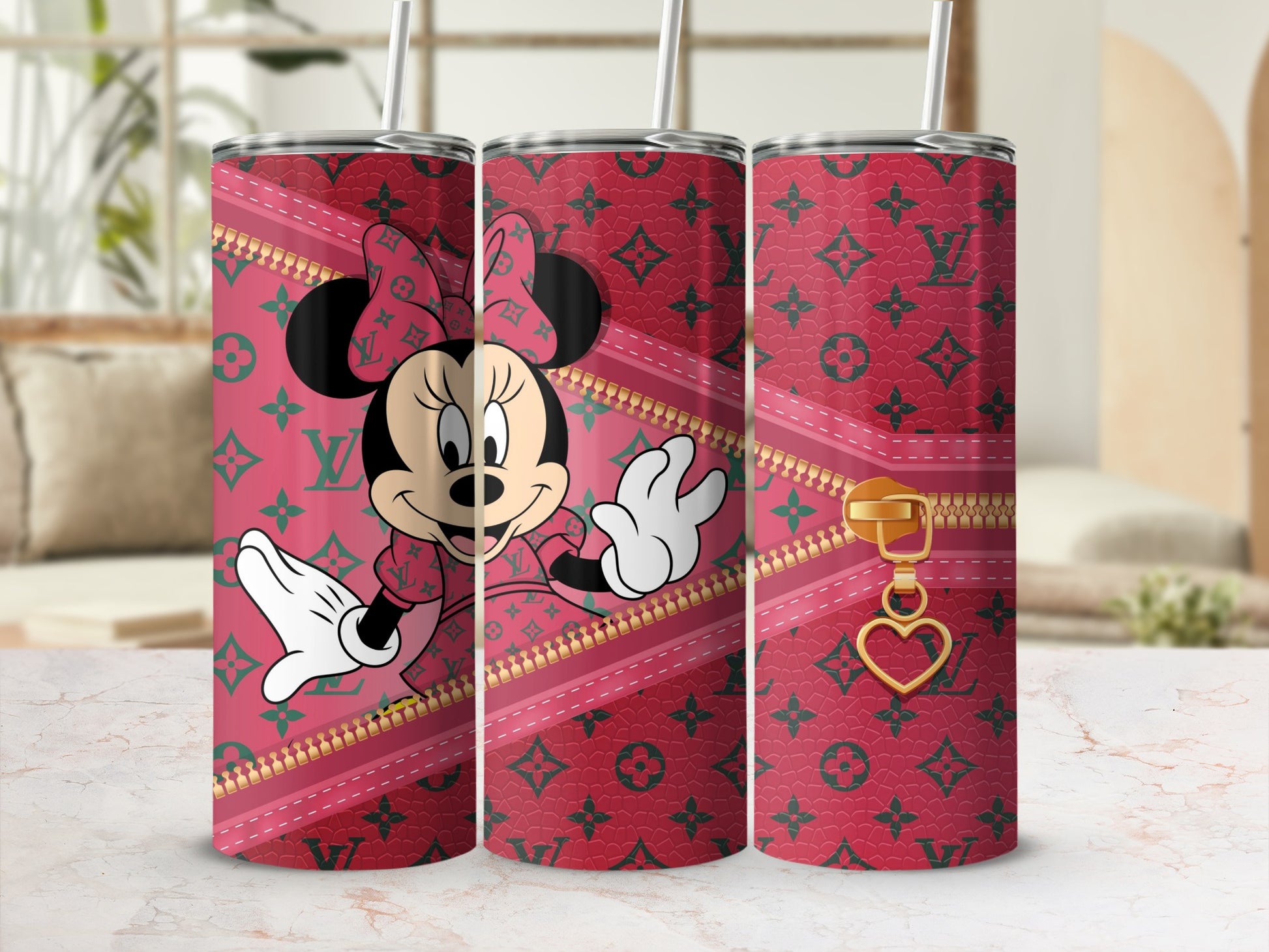 Minnie Mouse on pink, patterned tumbler with gold zipper and heart charm.