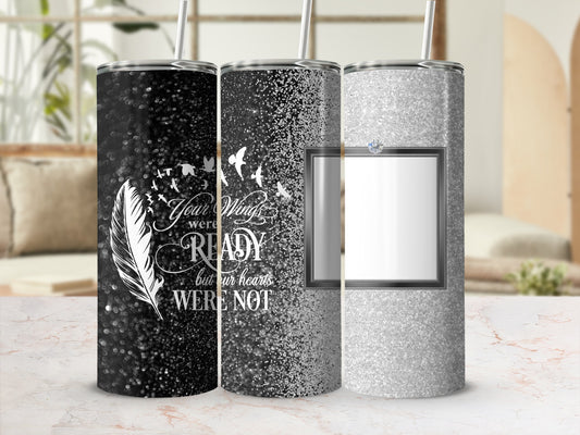 Three glitter tumblers with feather and bird designs.