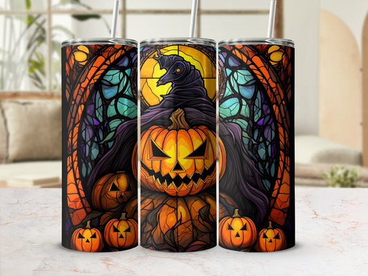 Stained glass tumbler with jack-o'-lantern and pumpkins, Halloween theme.