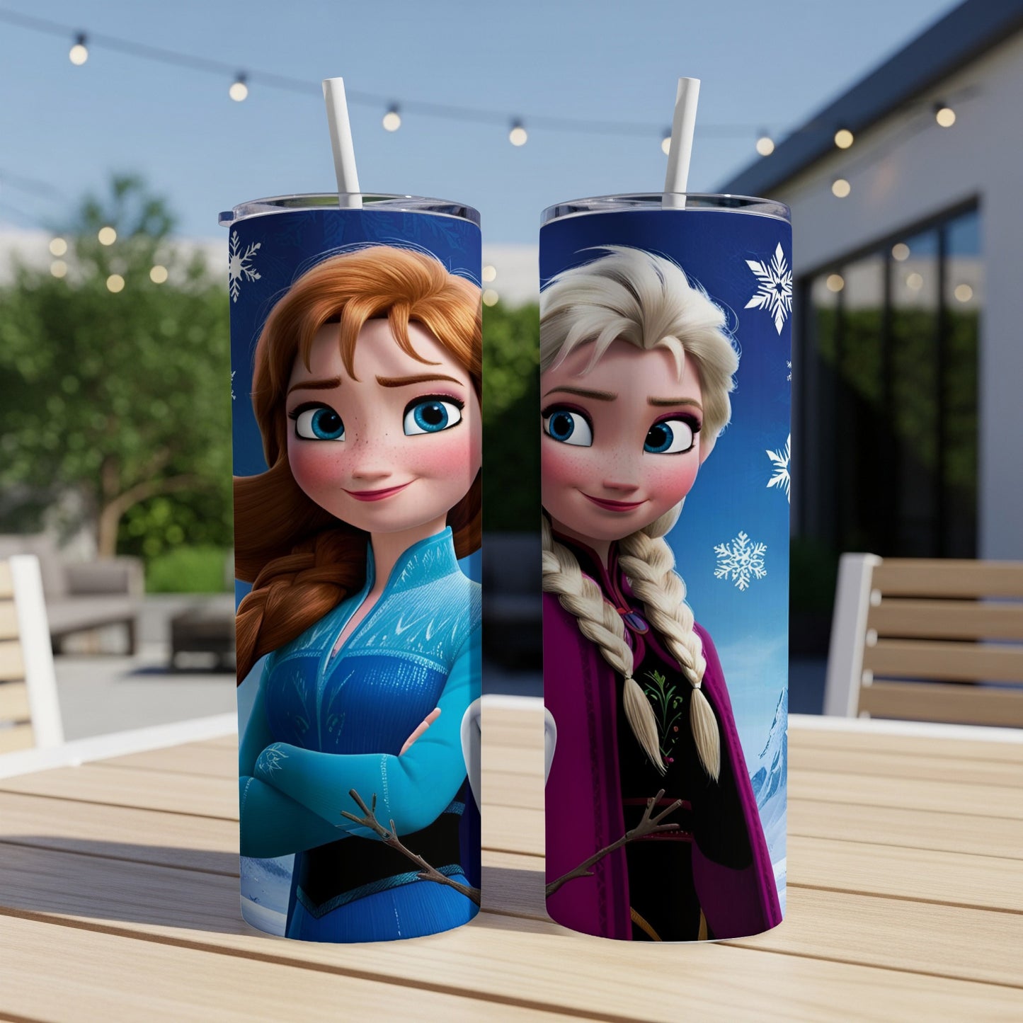 Two tumblers featuring Anna and Elsa from Frozen, outdoors on a table.