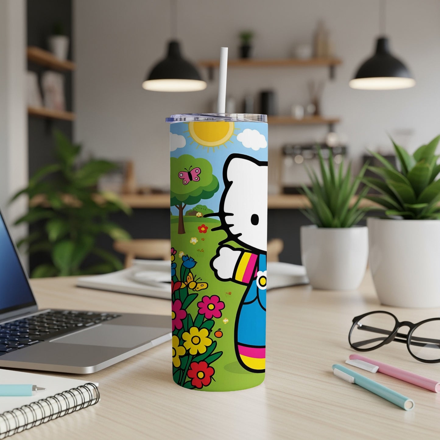 Hello Kitty in a blue dress on a pink tumbler with flowers and butterflies.