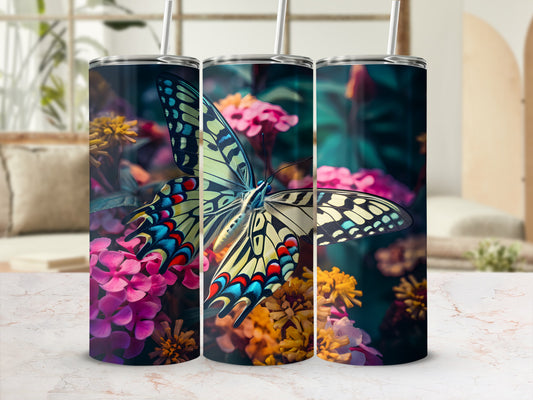 Three tumblers featuring a vibrant butterfly on a floral background.