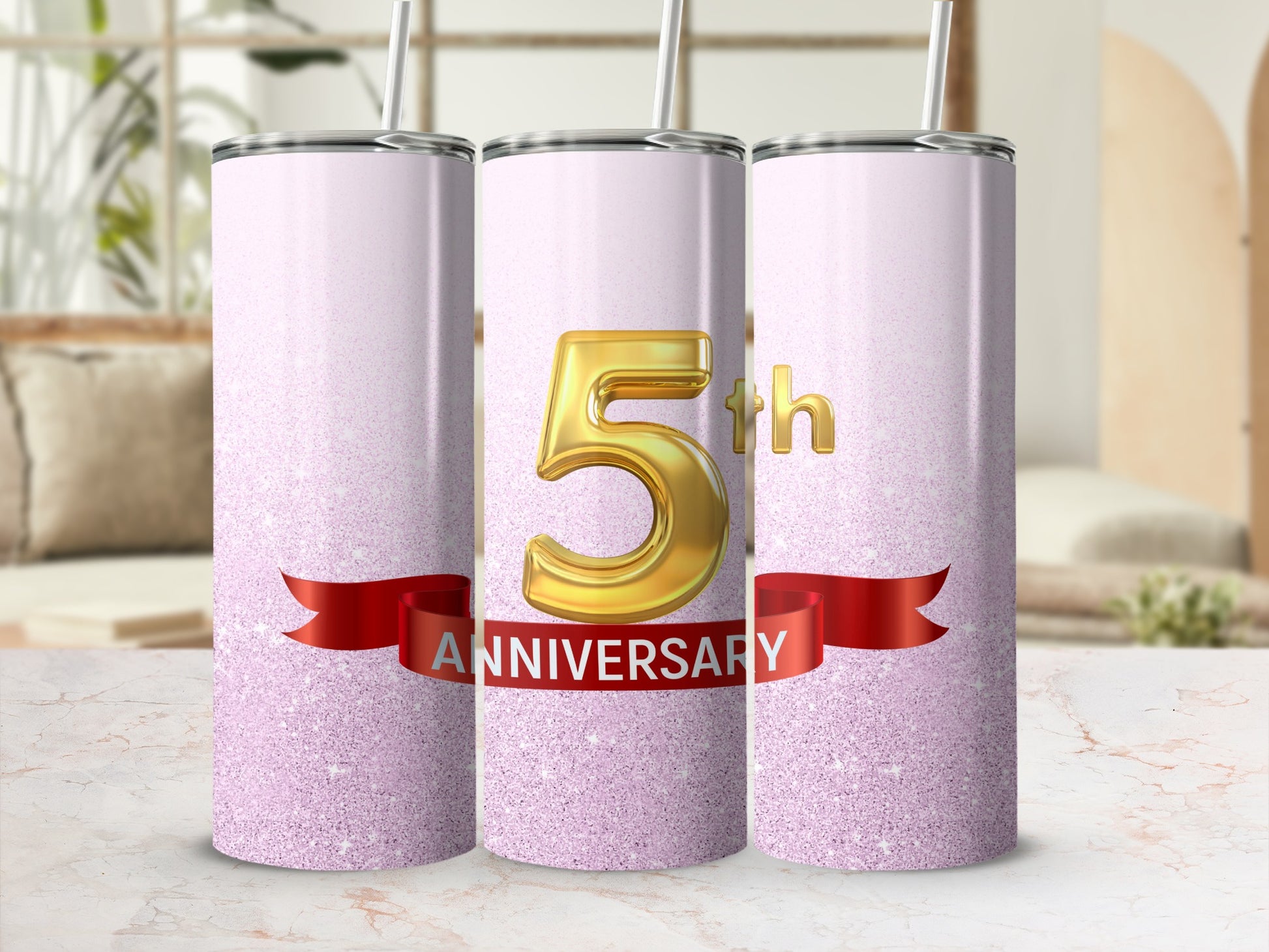 Gold "5th Anniversary" text on a sparkly pink tumbler with red ribbon.