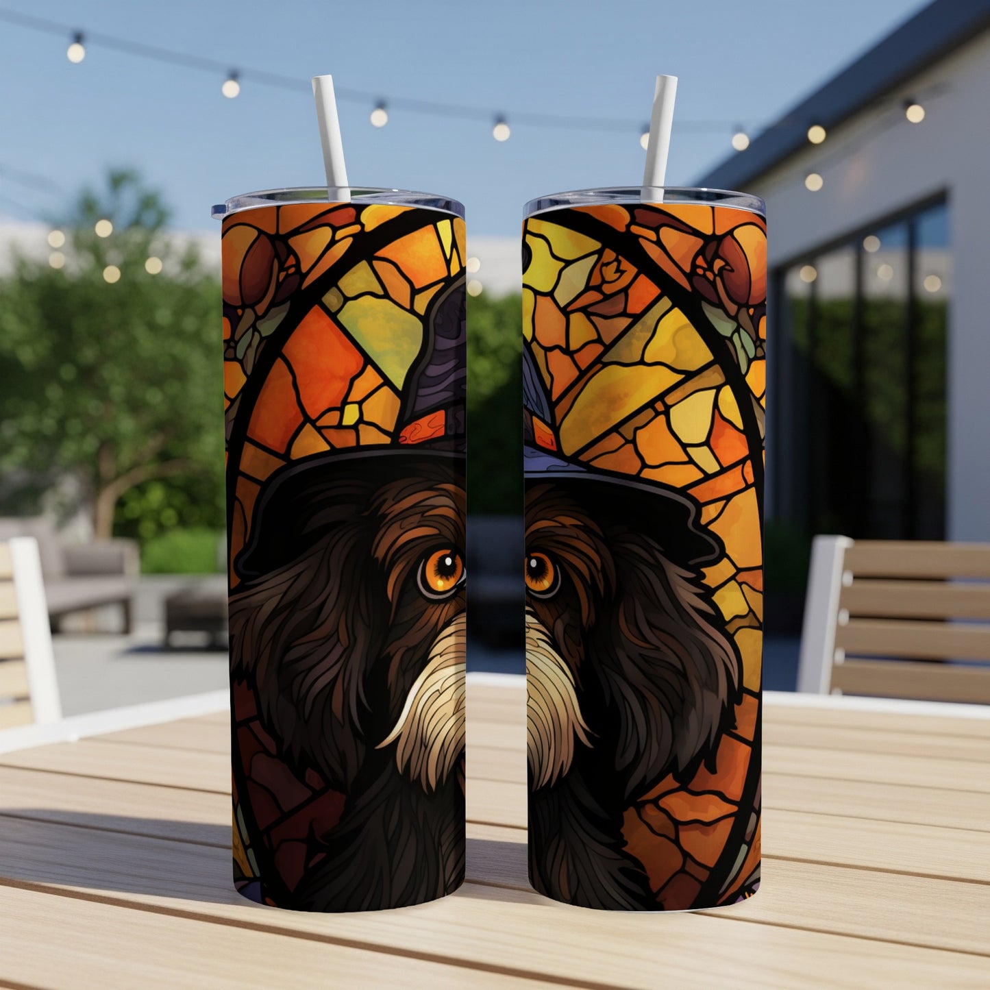 Dog wearing a witch hat, stained glass design, on two tumblers.