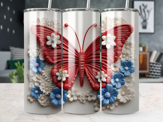 Tumbler with red butterfly and white and blue flowers design.