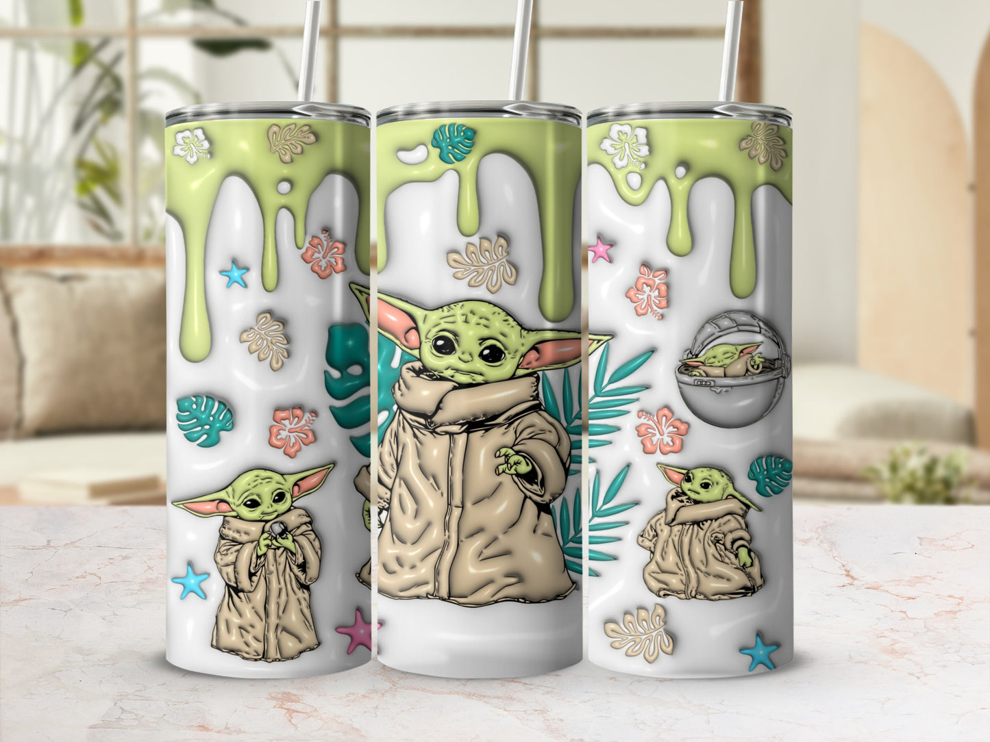 Three tumblers featuring Grogu from Star Wars, with dripping green glaze and floral accents.