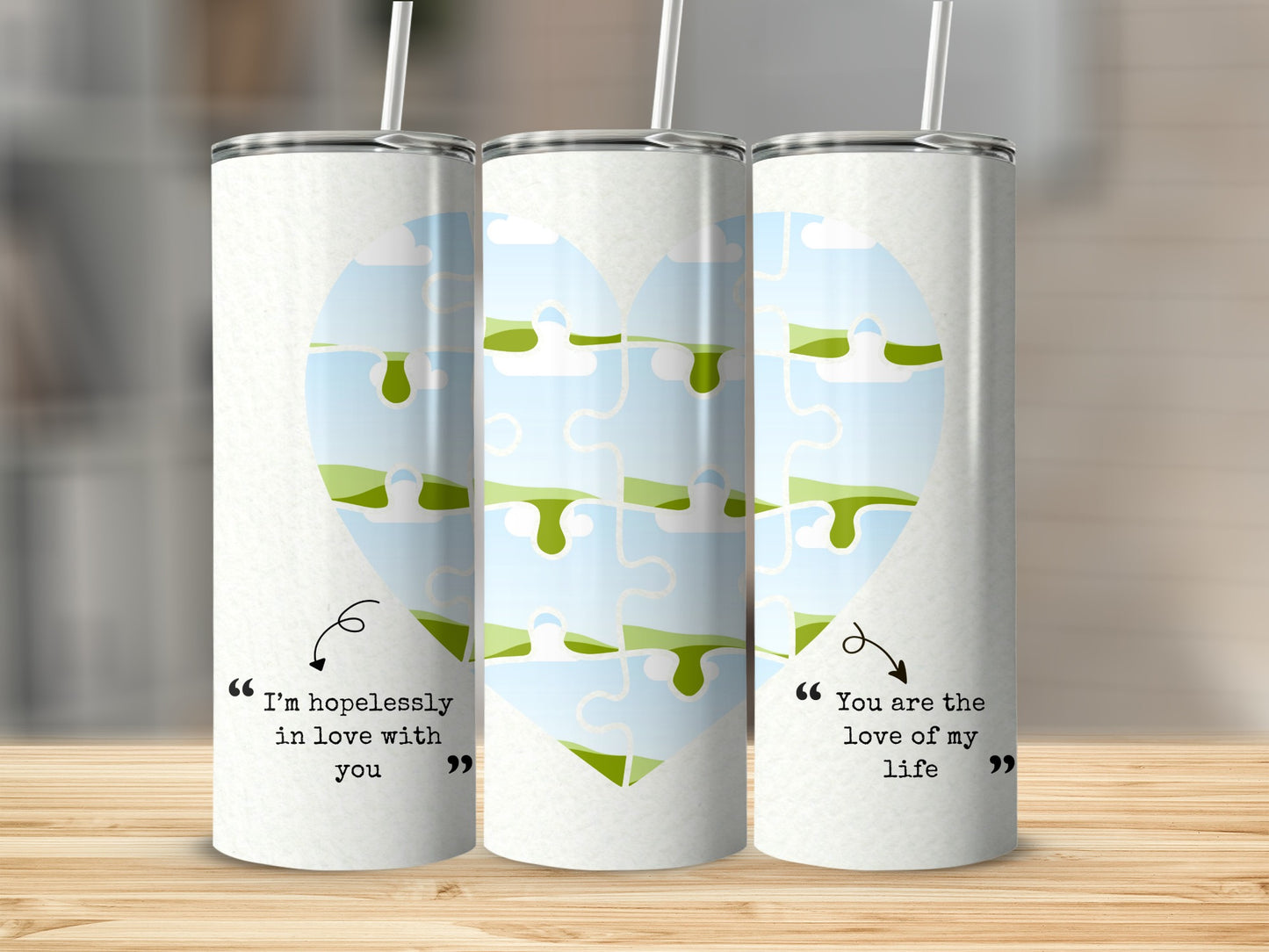 Three tumblers with a puzzle heart graphic, one says "I'm hopelessly in love with you".