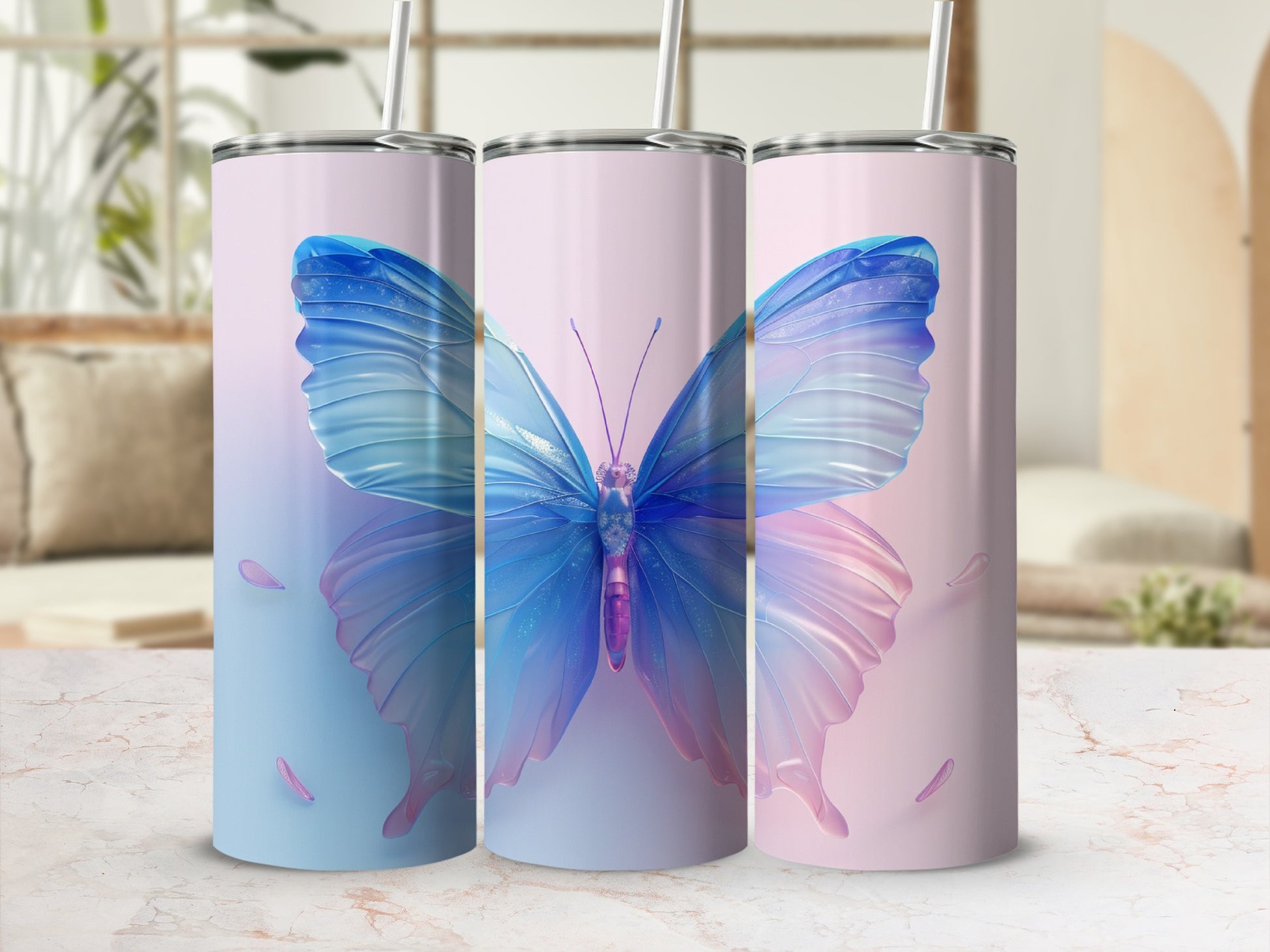 Three tumblers featuring a large blue butterfly with pastel wings and ombre background.