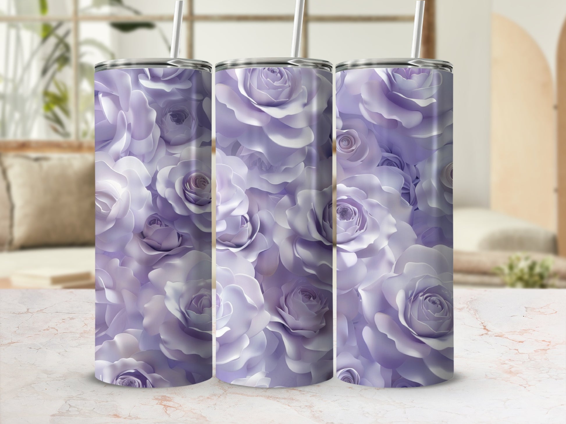 Purple roses pattern on three tall, slender tumblers with straws.