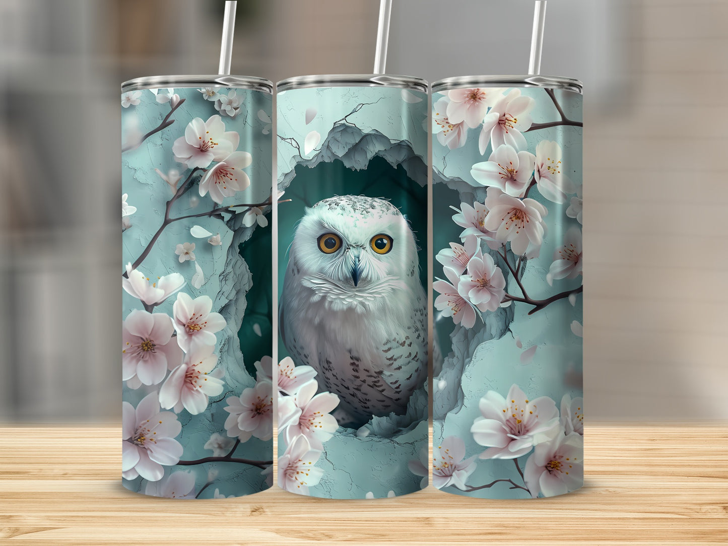 Three tumblers with snowy owl and cherry blossoms design.