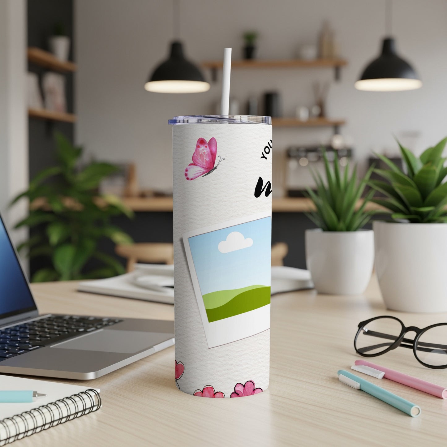 White tumbler with pink butterfly and photo frame design, straw included.