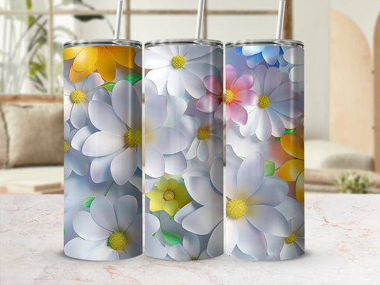 Three tumblers with delicate white and yellow daisy floral patterns.