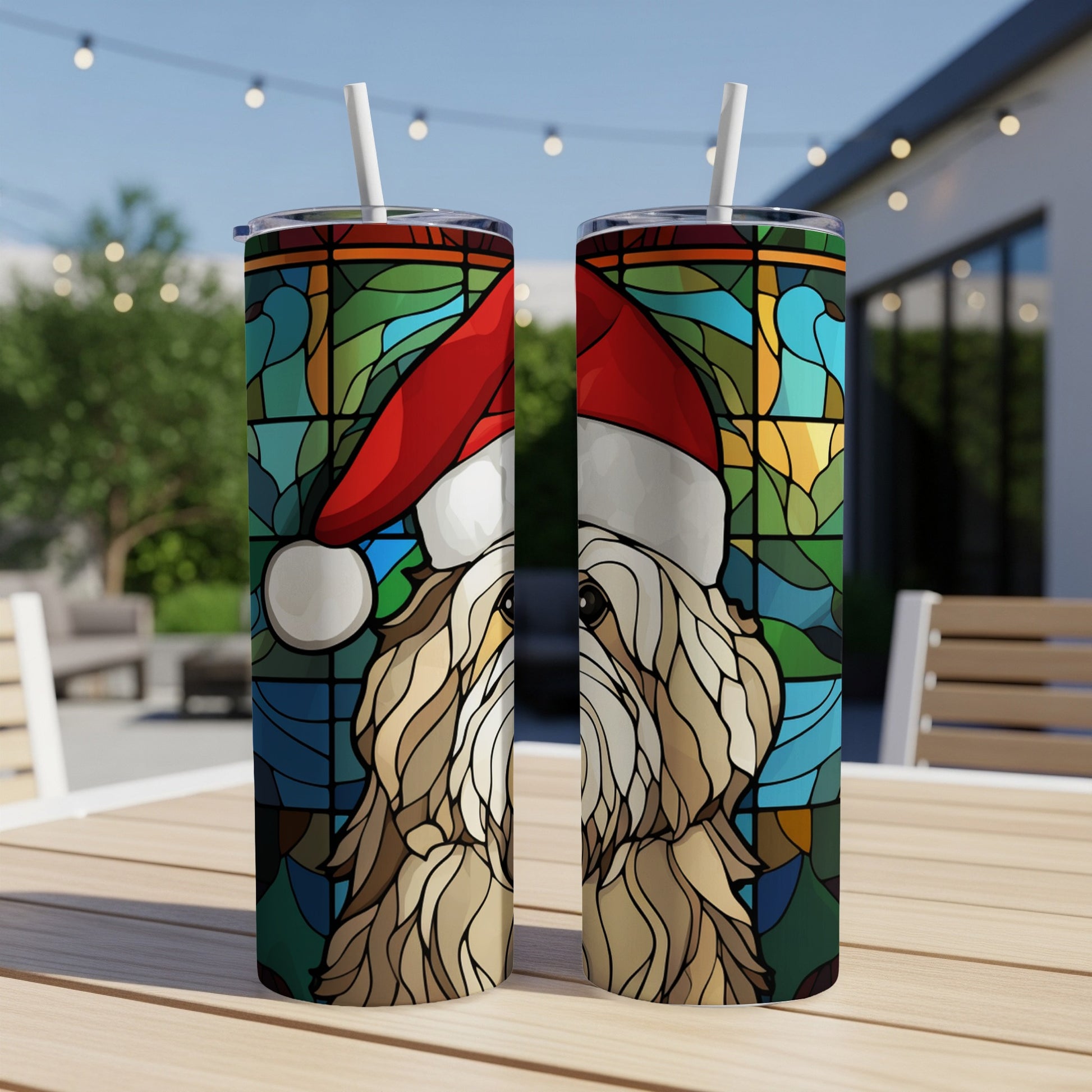Two tumblers with stained glass dog wearing Santa hat design.