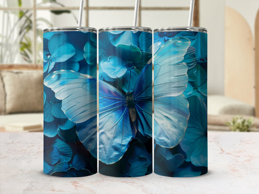 Blue butterfly on floral background tumbler.