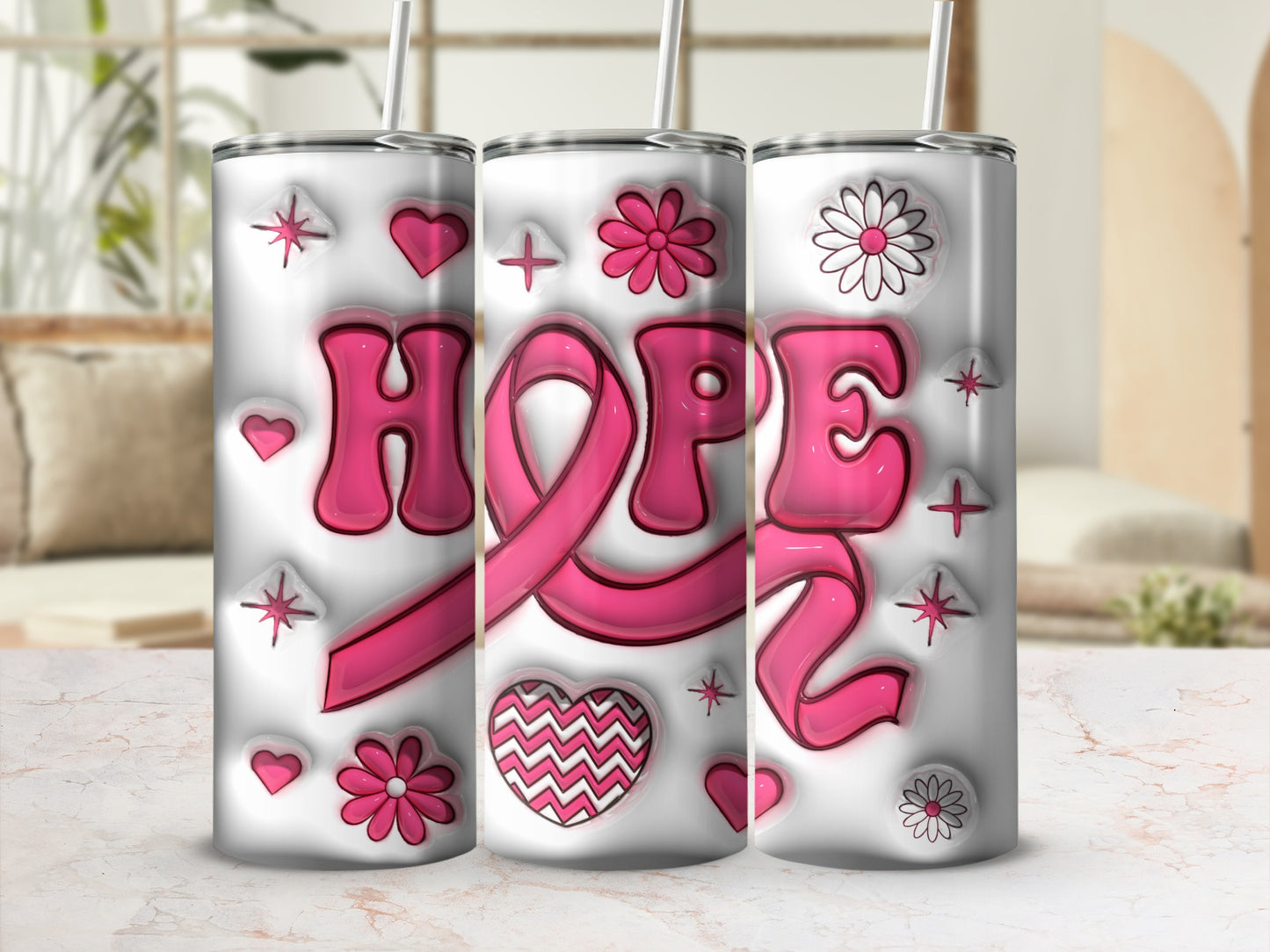 Pink "HOPE" text and ribbon on three tumblers with hearts and flowers.