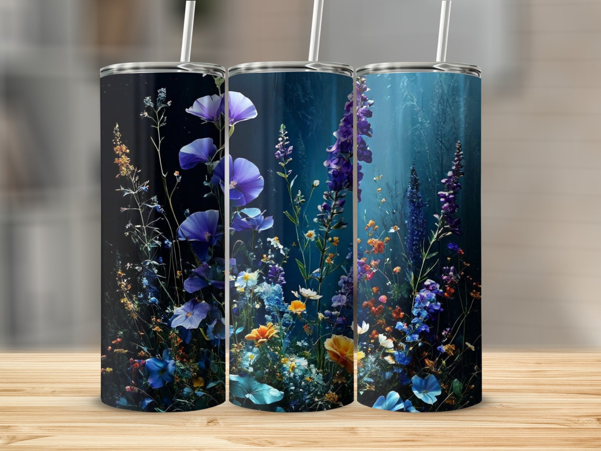 Three tall tumblers featuring a dark floral design with vibrant purple and blue flowers.