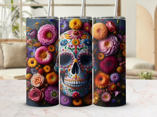 Floral skull design on three tumblers with straws.