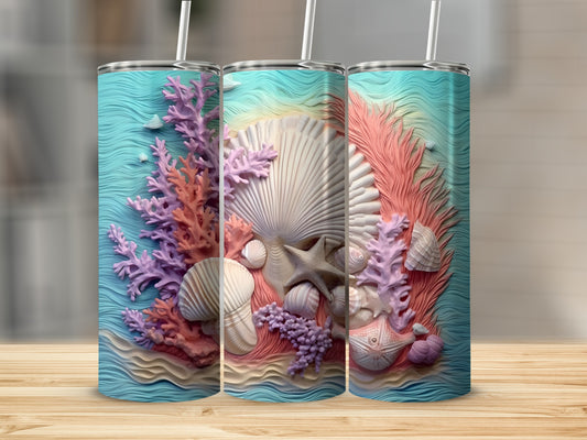 Three tumblers with ocean reef designs, featuring shells and coral.