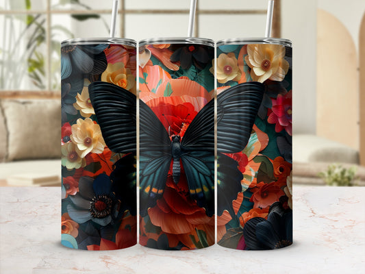 Tumbler with a black butterfly and colorful floral pattern.