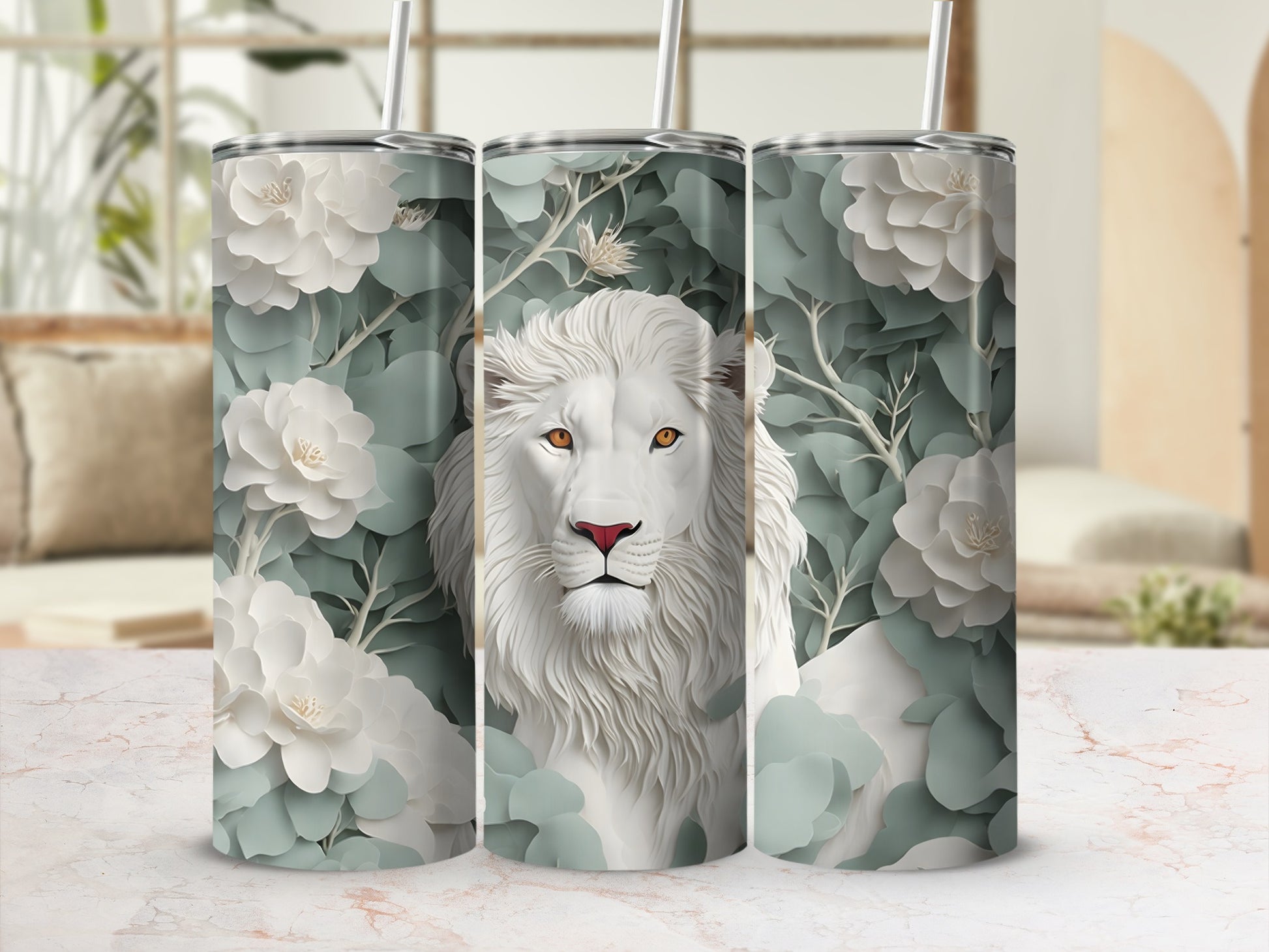 Lion head surrounded by white flowers and green foliage on a tumbler.