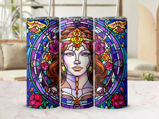 Woman's face surrounded by colorful stained glass floral wreath.