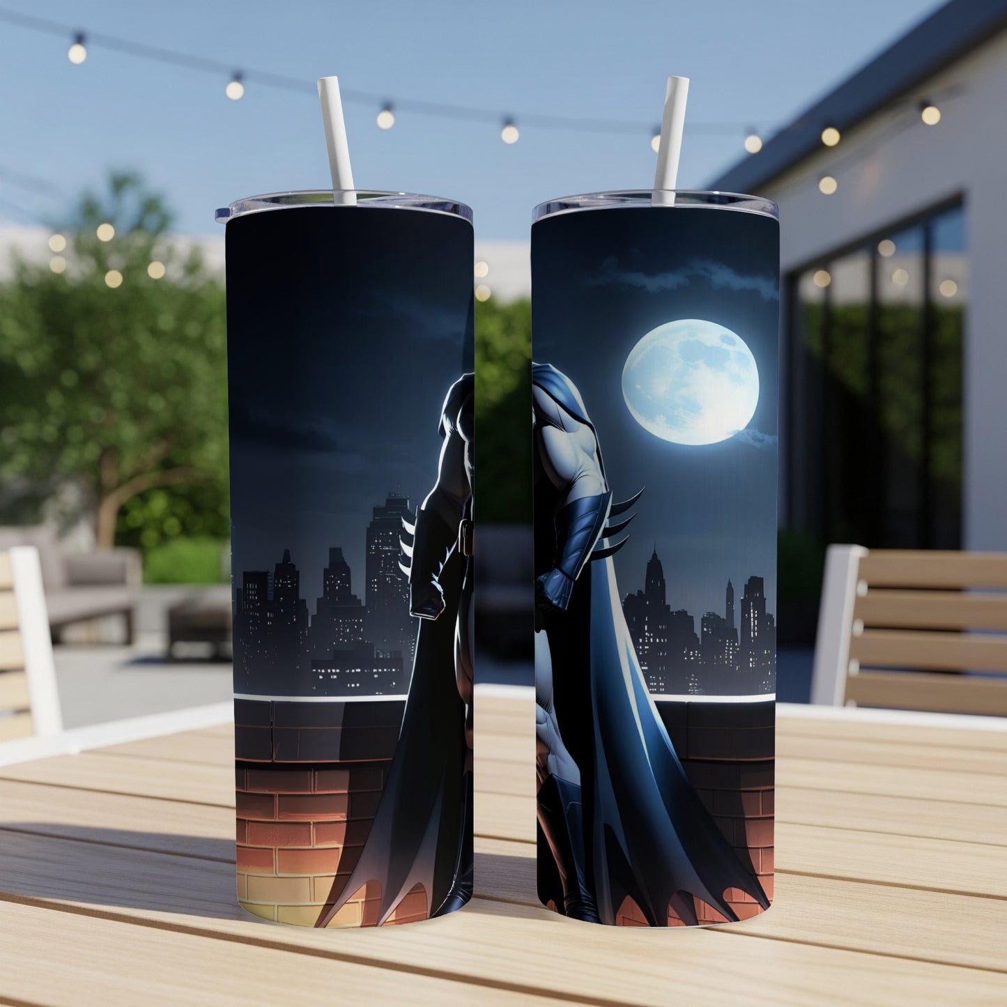 Batman silhouette against city skyline and full moon on a tumbler.