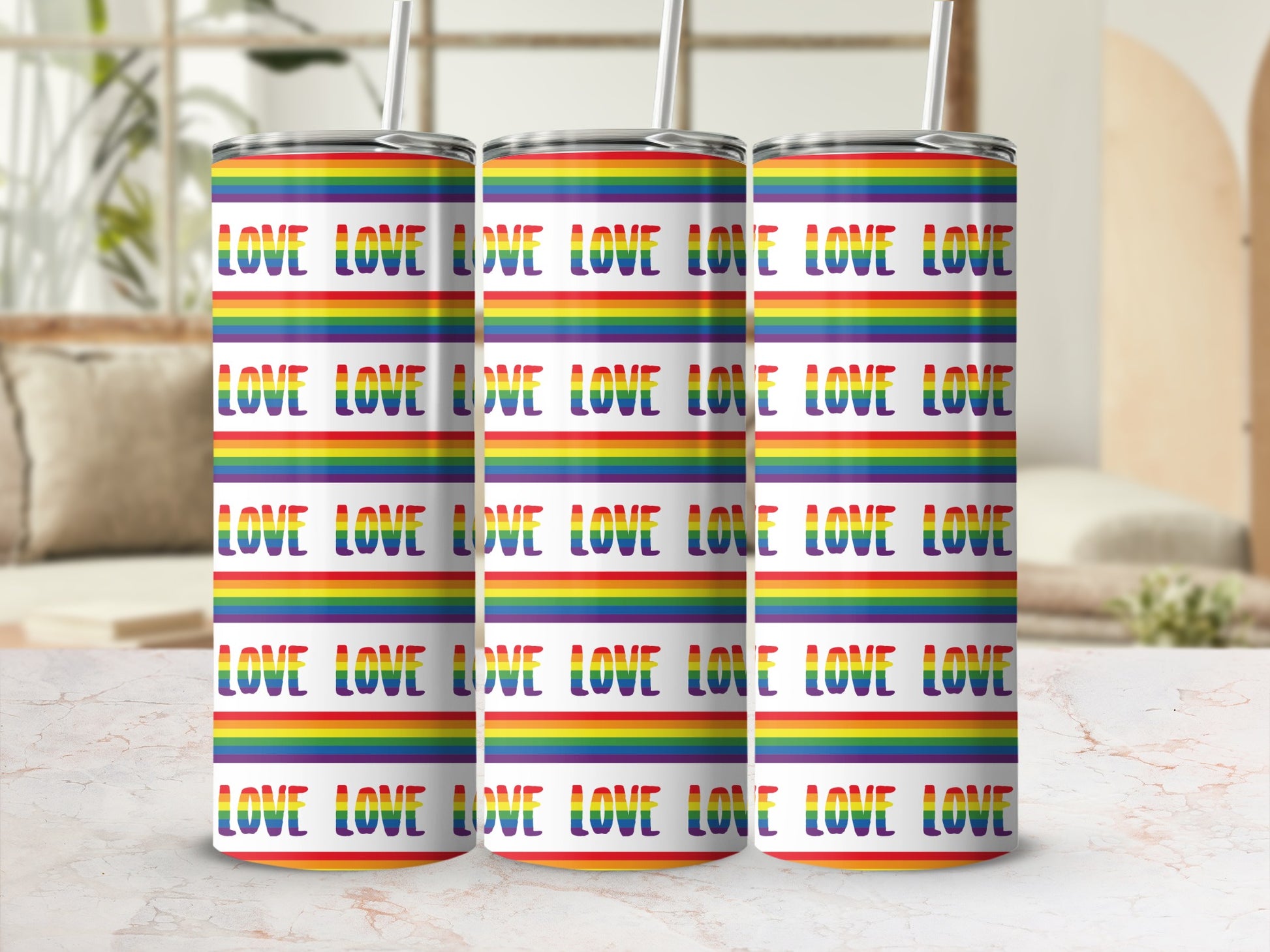 Rainbow striped tumbler with repeating "LOVE" pattern.