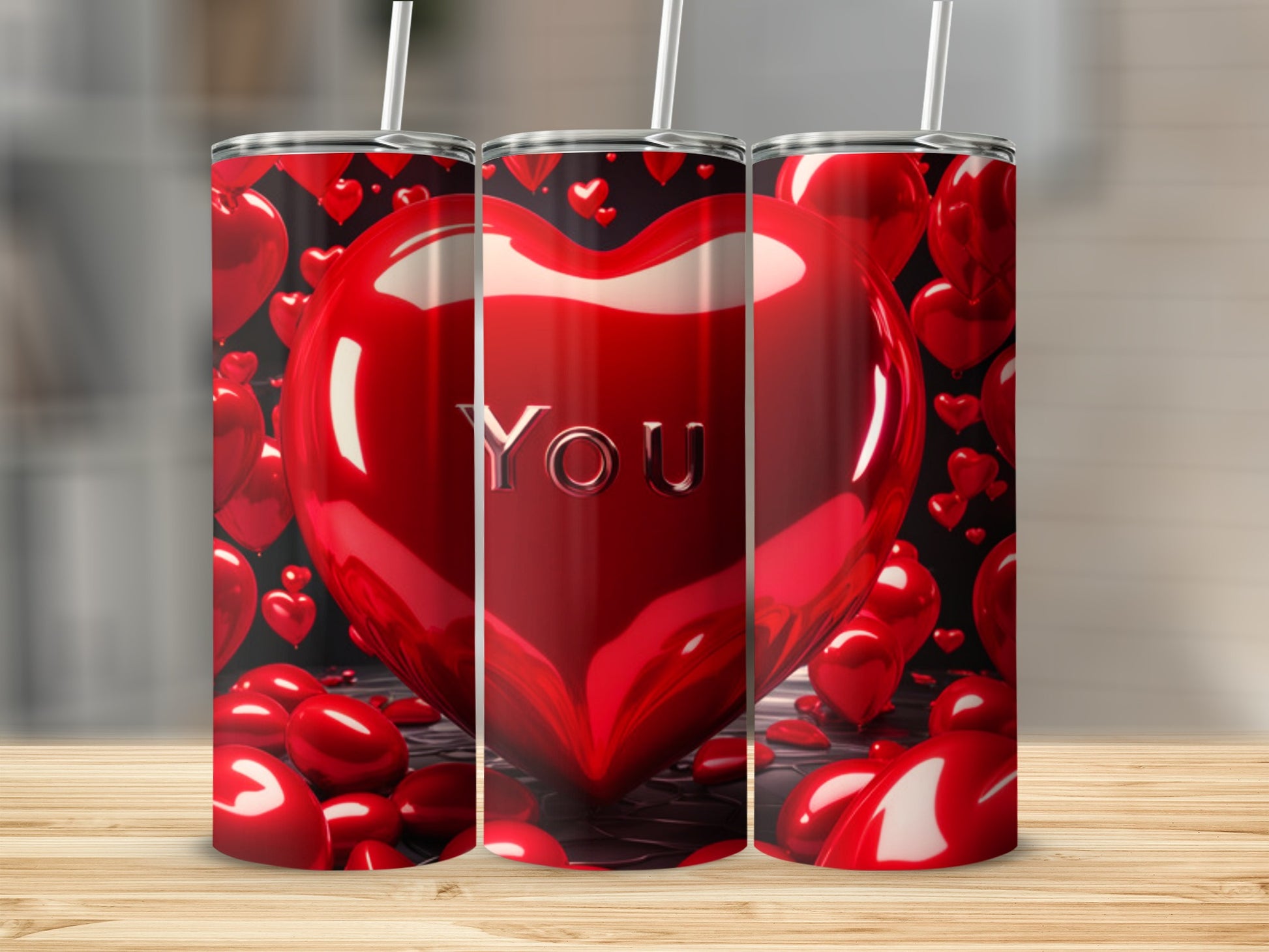 Three tall tumblers with a heart pattern and "YOU" text.
