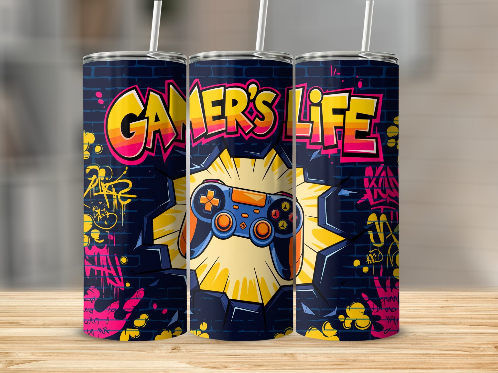 Tumbler with "Gamer's Life" text and controller graphic.