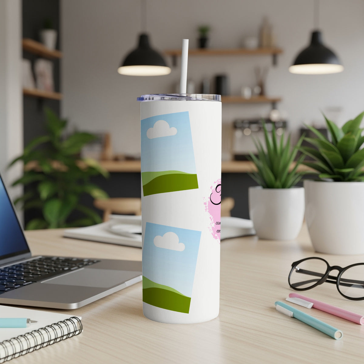 White tumbler with sky and landscape photos and pink "G" design.