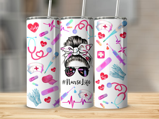 Three tumblers with nurse-themed graphics on a wooden surface.