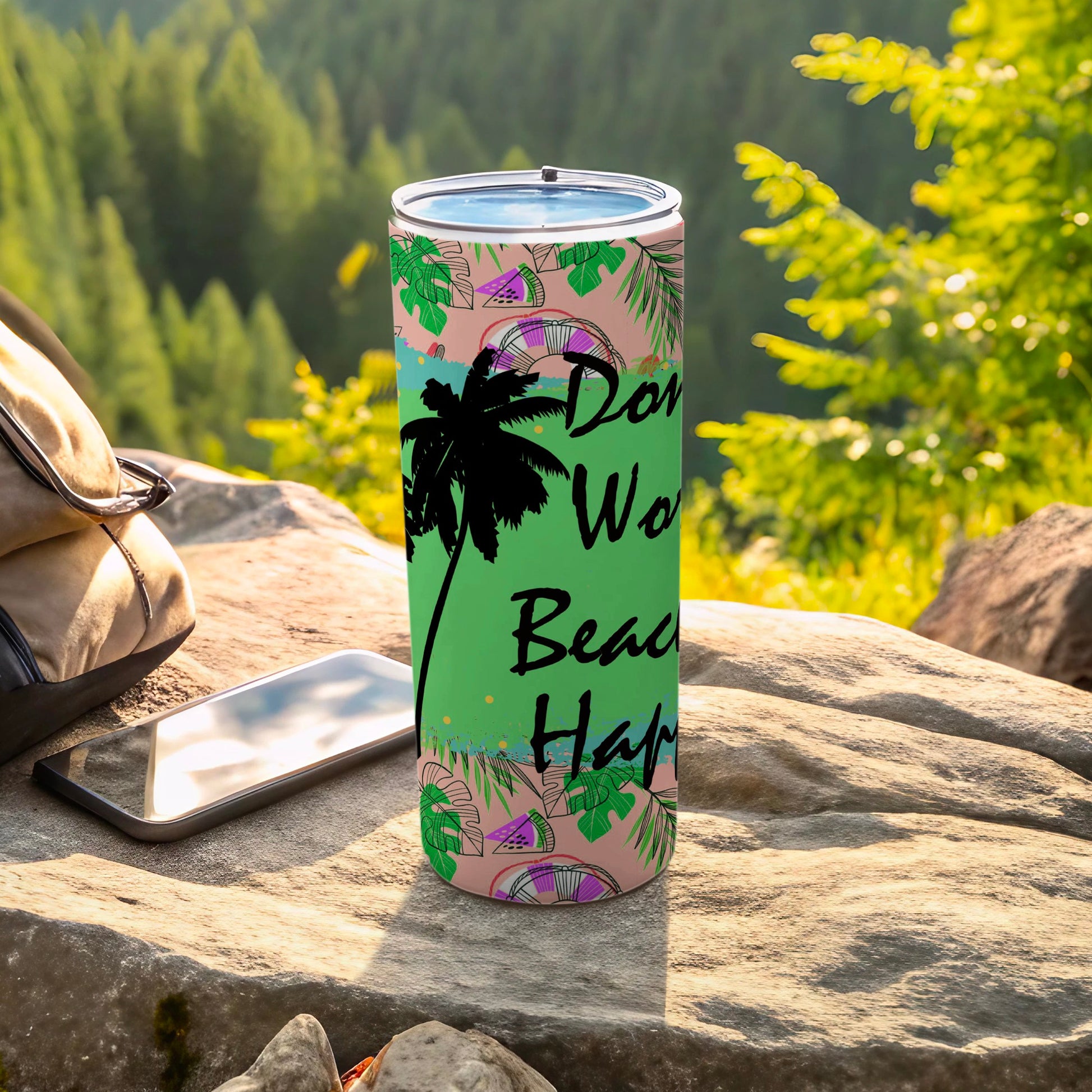 Green tumbler with palm trees, tropical leaves, and "Don't Worry Beach Happy" text.