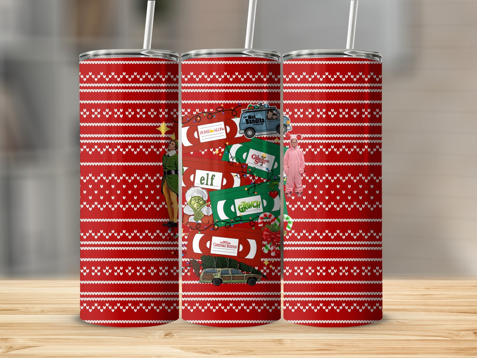 Christmas movie icons on a red and white patterned tumbler.