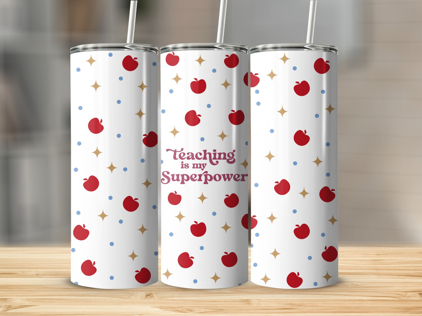 Three tumblers with red apples and blue stars on a white background.