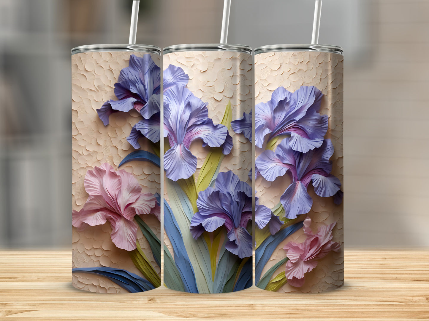 Three tumblers with textured backgrounds and floral iris designs.