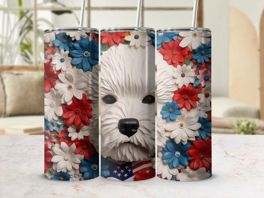 White dog with American flag bandana surrounded by red, white, and blue flowers.